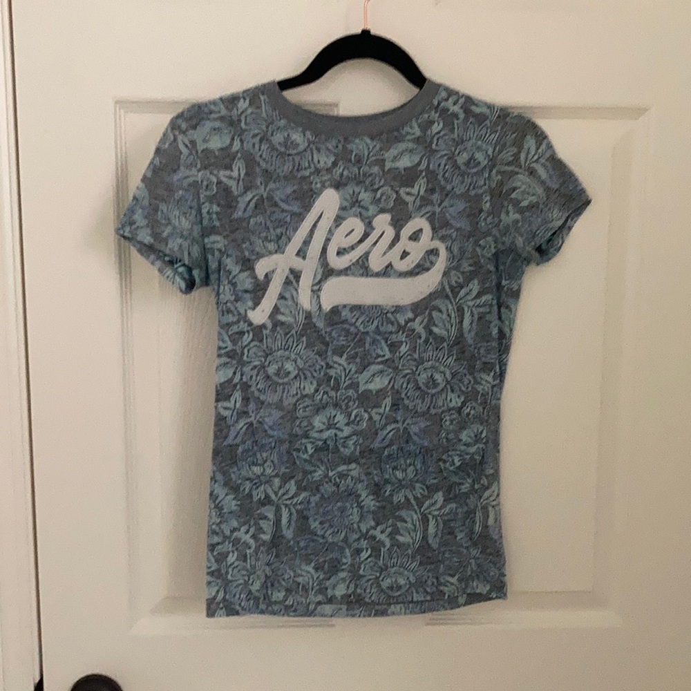 A beautiful tea with flowers and the aero logo